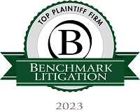 Green “Benchmark Litigation – Top Plaintiff Firm 2023” badge.