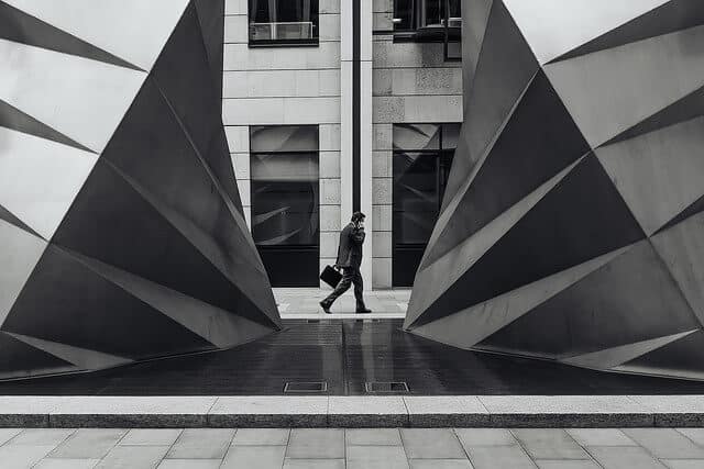 Man in front of office