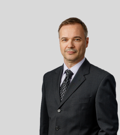 Igor Sikavica bioimage: Studio portrait of a man in dark suit with tie