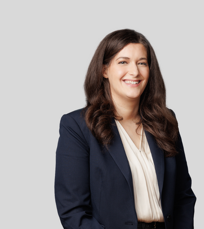 Barbara Schwartz bioimage: Studio portrait of a woman in black blazer