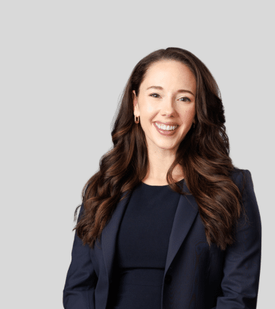 Lyndsey B. Campbell: Studio portrait of a woman with long hair wearing blazer