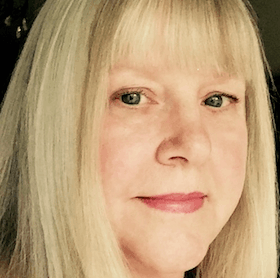 Kathy L. Vander Veur Woman with long blonde hair, close-up portrait, neutral expression.