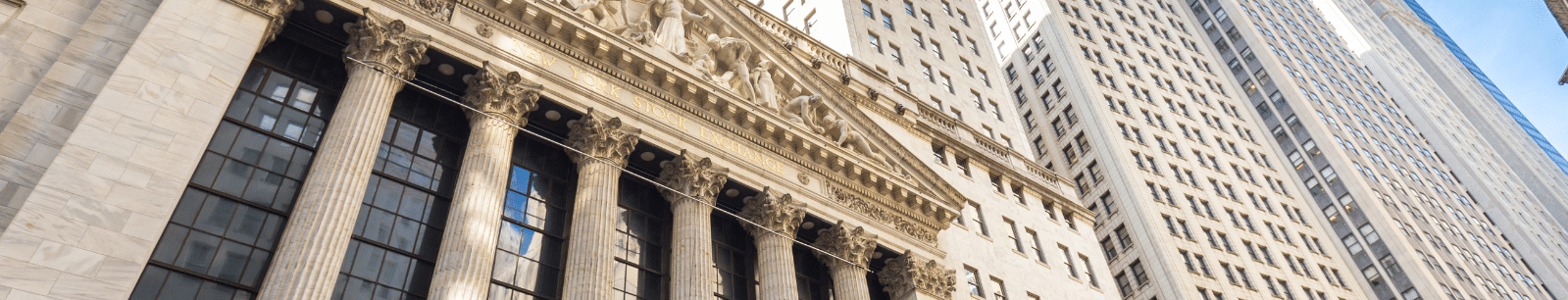 Upward view of courthouse columns and architecture
