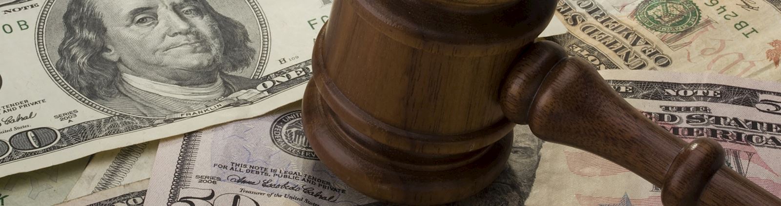 Judge’s gavel resting on a desk symbolizing legal proceedings